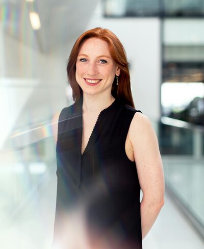 woman with red hair smiling